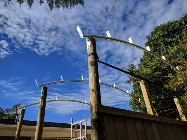 Canopy arches mounted on timber posts