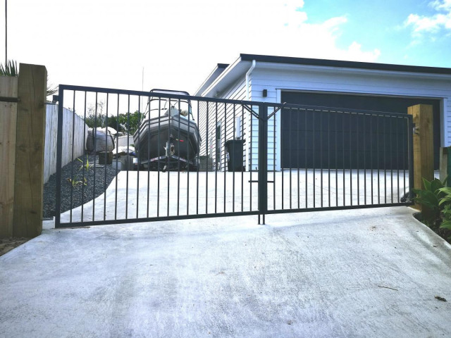Manual gates at a slipway, painted