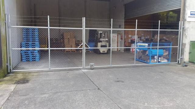 Security gates with barbed wire