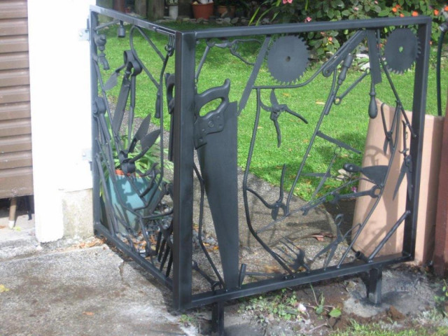 Tool themed pedestrian gate, painted finish