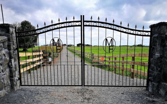 Wrought iron type swing gates with custom initials - Painted finish